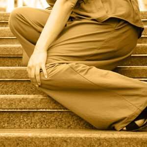 woman sitting on stairs